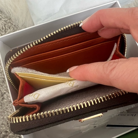 The Dooney & Bourke Greta Large Zip Around Credit Card Case - Picture 7 of 14